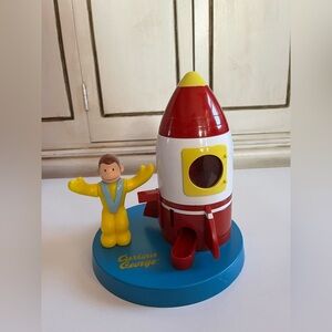 Vintage Curious George Rocket/Spaceship Bubble Gum Coin Bank Dispenser 1999